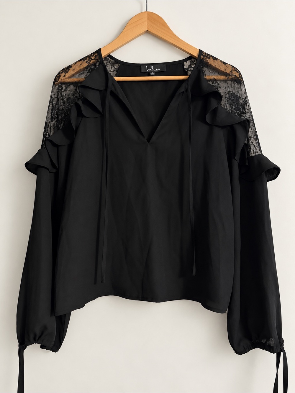 Lulu's Black Lace-Shoulder Ruffle V-Neck Blouse with Tie